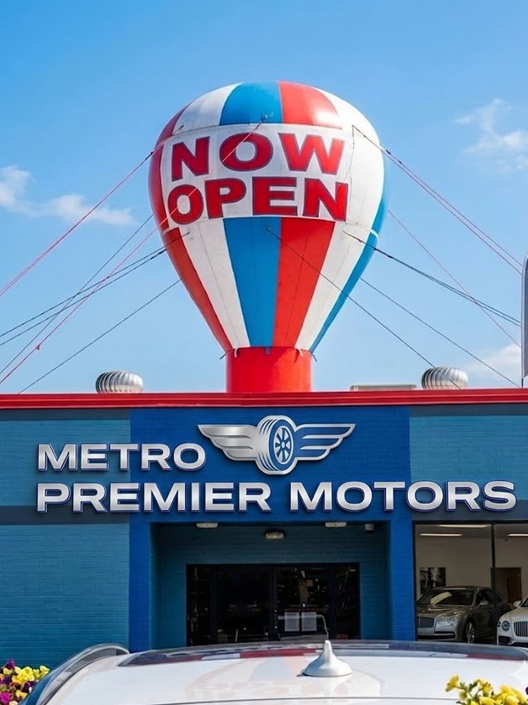 Giant rooftop advertising balloon for roadside dealership lot visibility